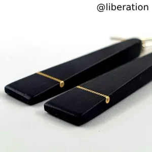 Piano key earrings with a twist