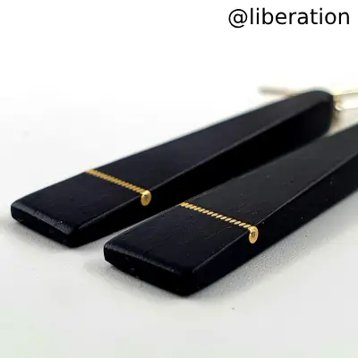 Piano key earrings with a twist